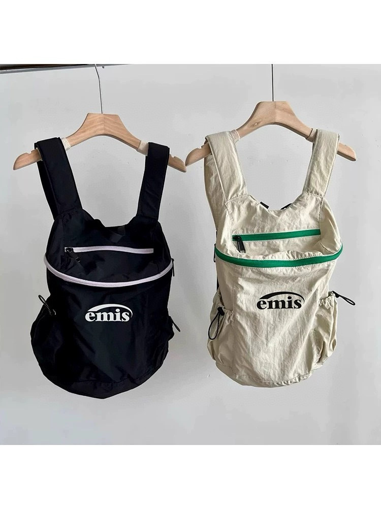 款号#1501 emis百搭双肩背包尼龙布旅行学生书包轻便大容量背包 颜色:黑色 米黄 尺寸:33×12×42cm · image 7