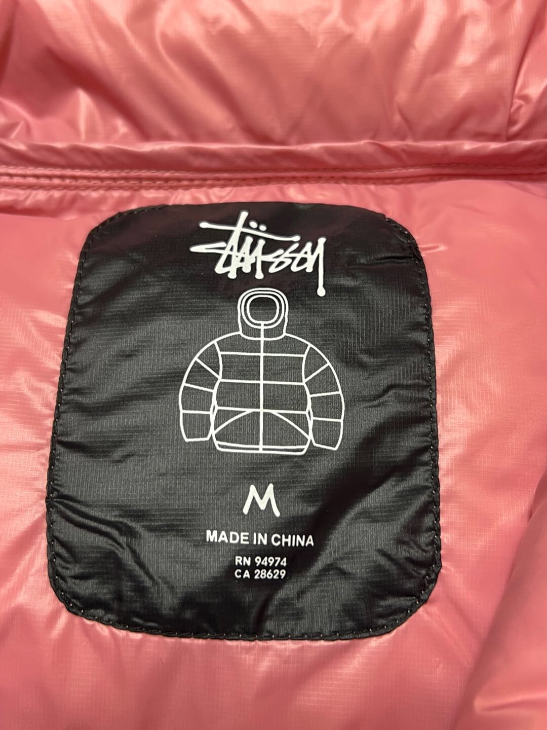 P879  Stussy down jacket · image 18