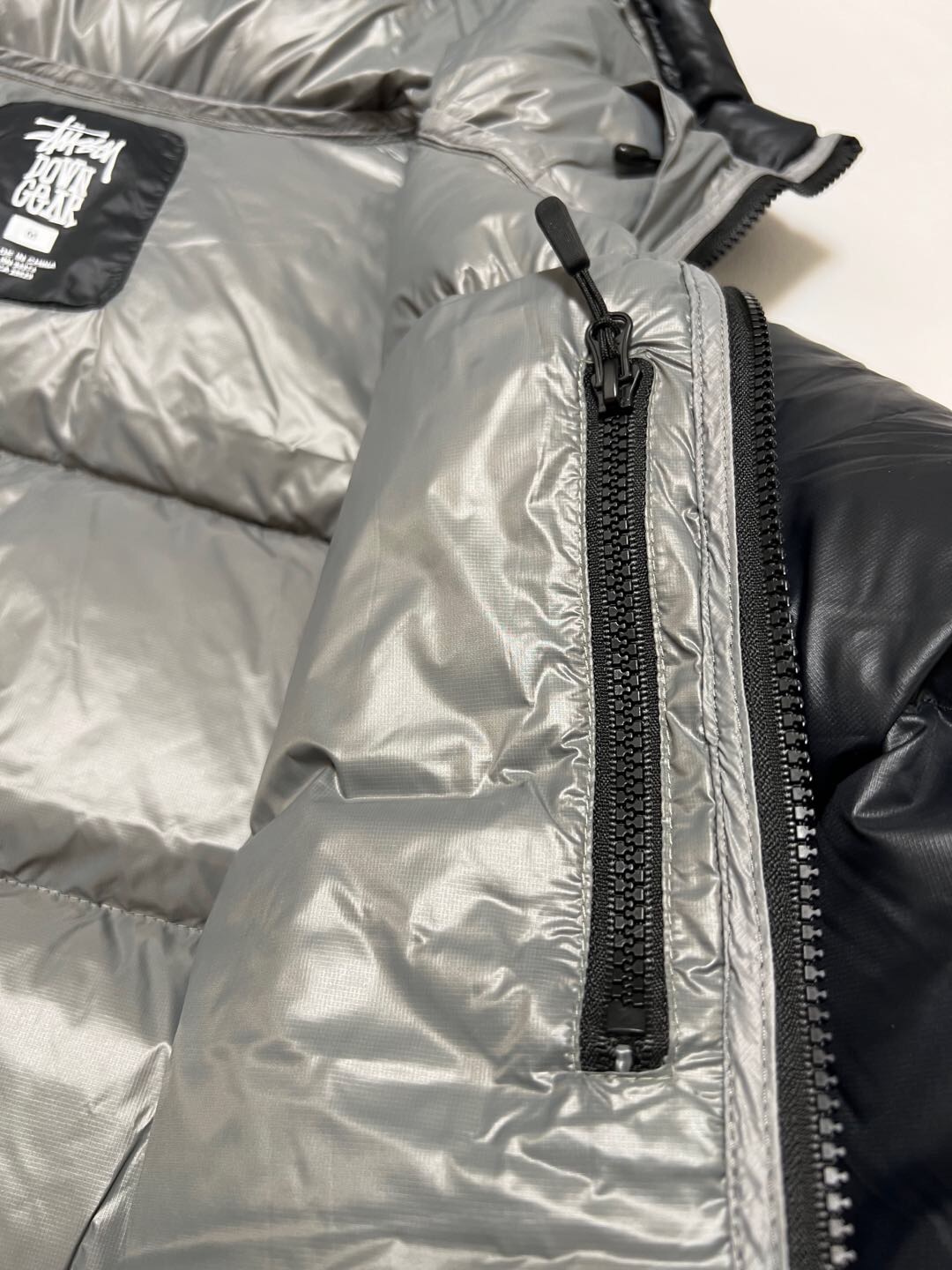 P879  Stussy down jacket · image 19