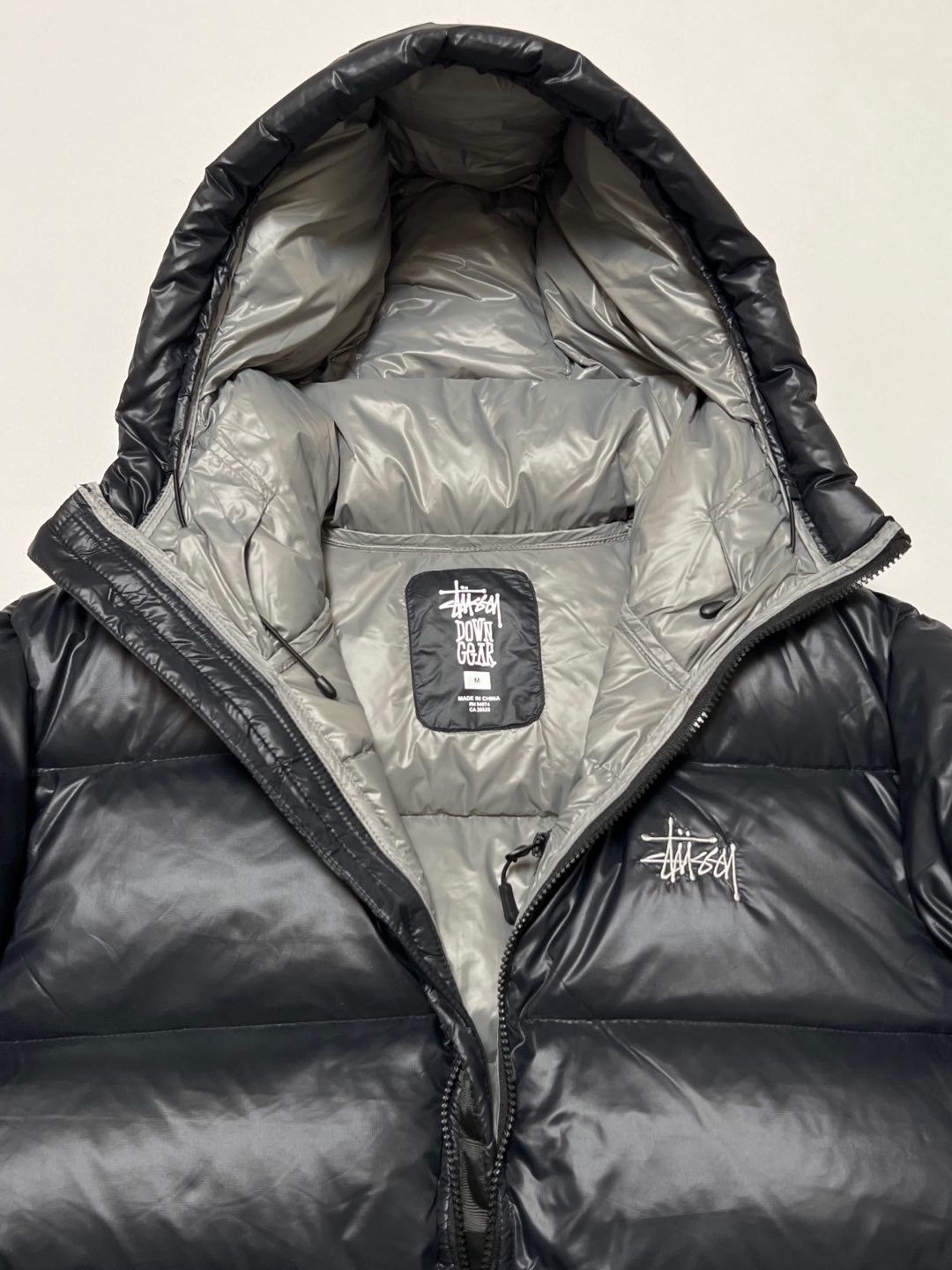 P879  Stussy down jacket · image 9